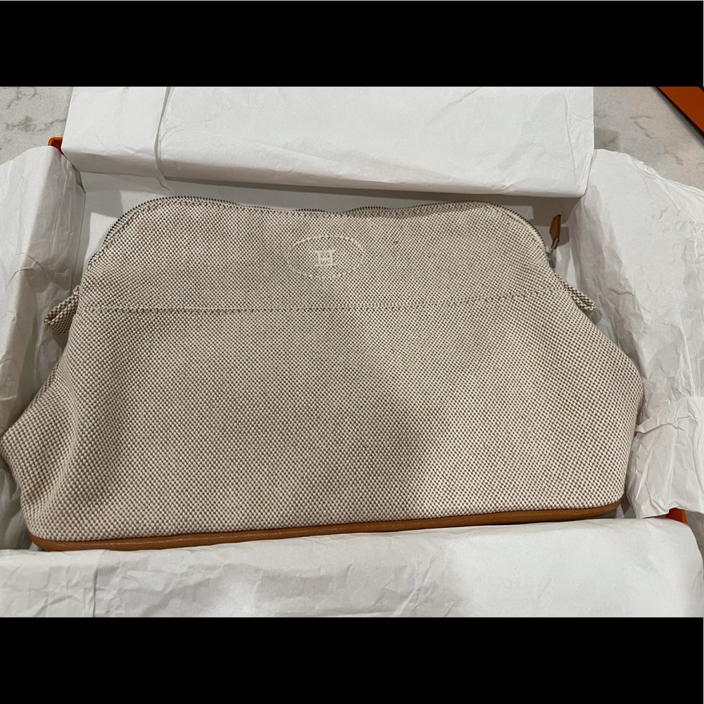 Hermès cosmetic pouch.